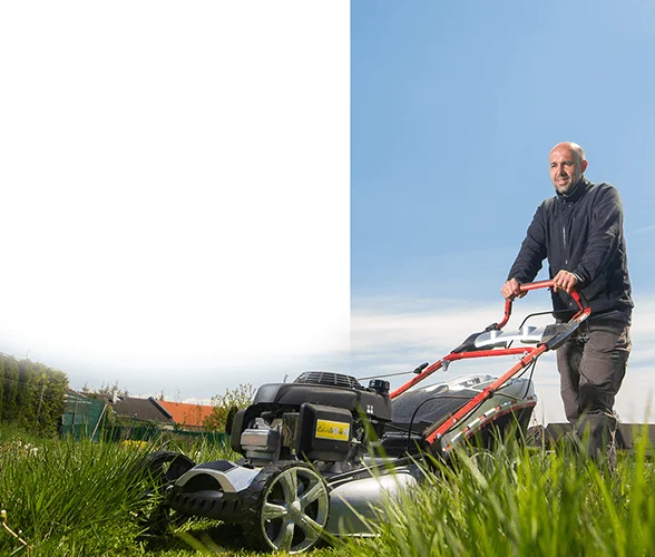 Man mowing lawn for property maintenance